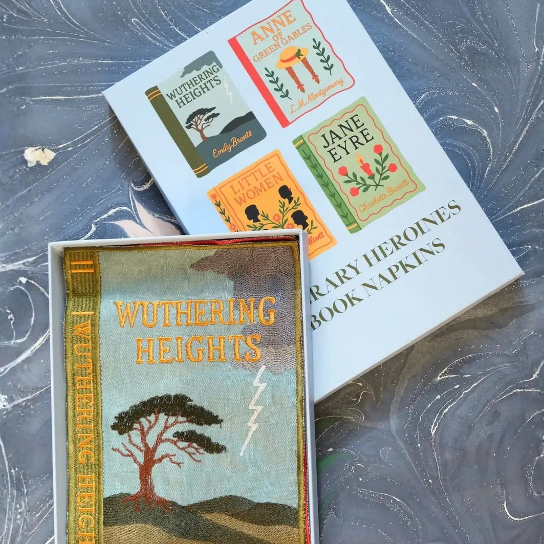 Book-themed napkins with 'Wuthering Heights' design on a metallic surface