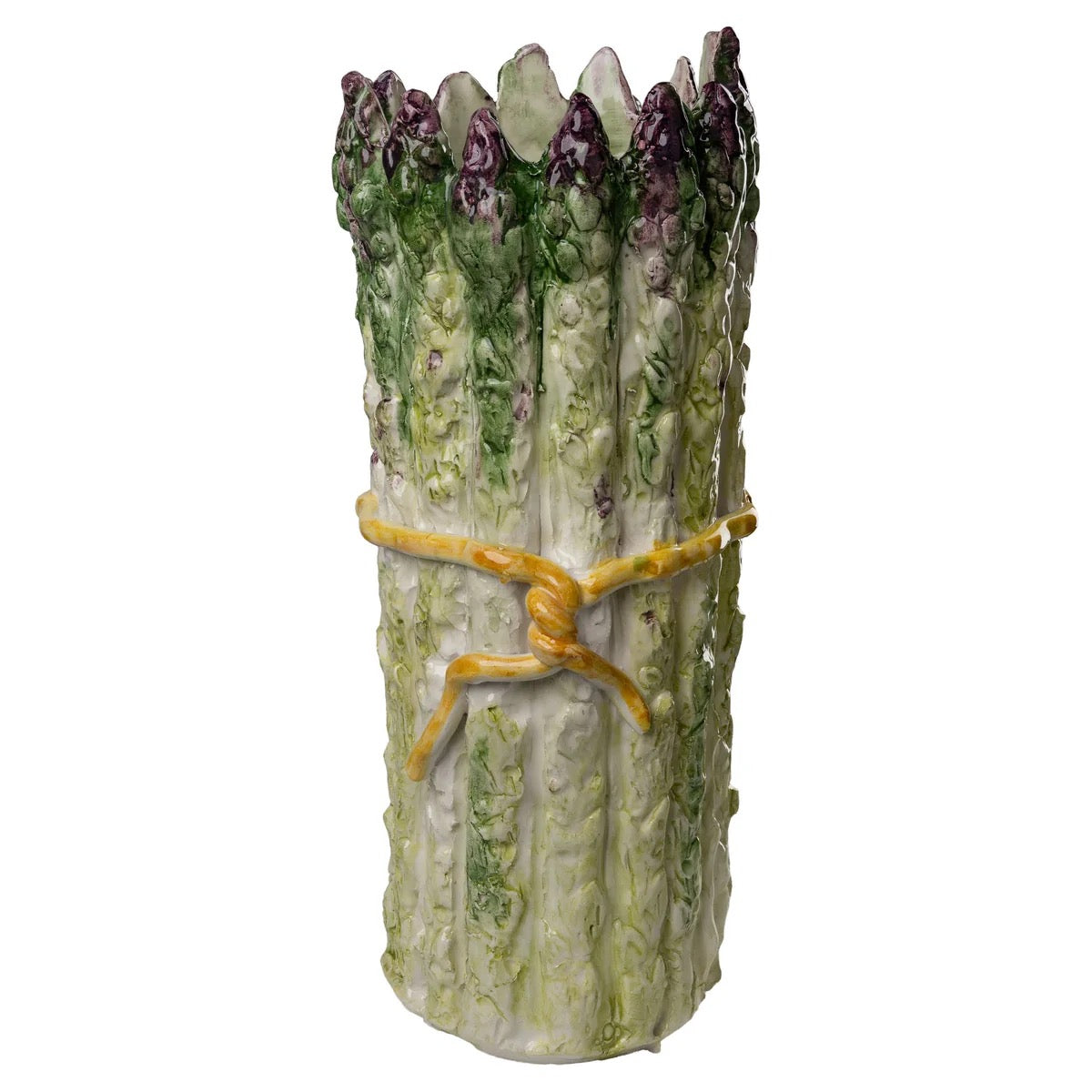 Decorative vase shaped like a bundle of asparagus with a yellow ribbon on a white background