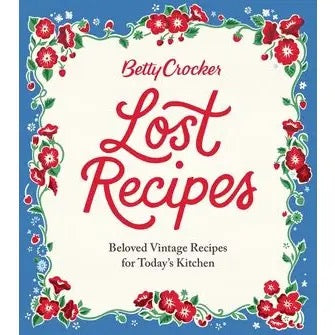 Front cover of the book 'Lost Recipes' by Betty Crocker, featuring a cream background with red script title text, a blue border, and red floral illustrations with green leaves around the edges.