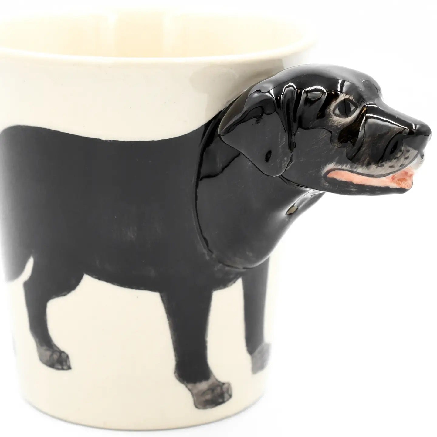 Black dog-shaped mug on a white background