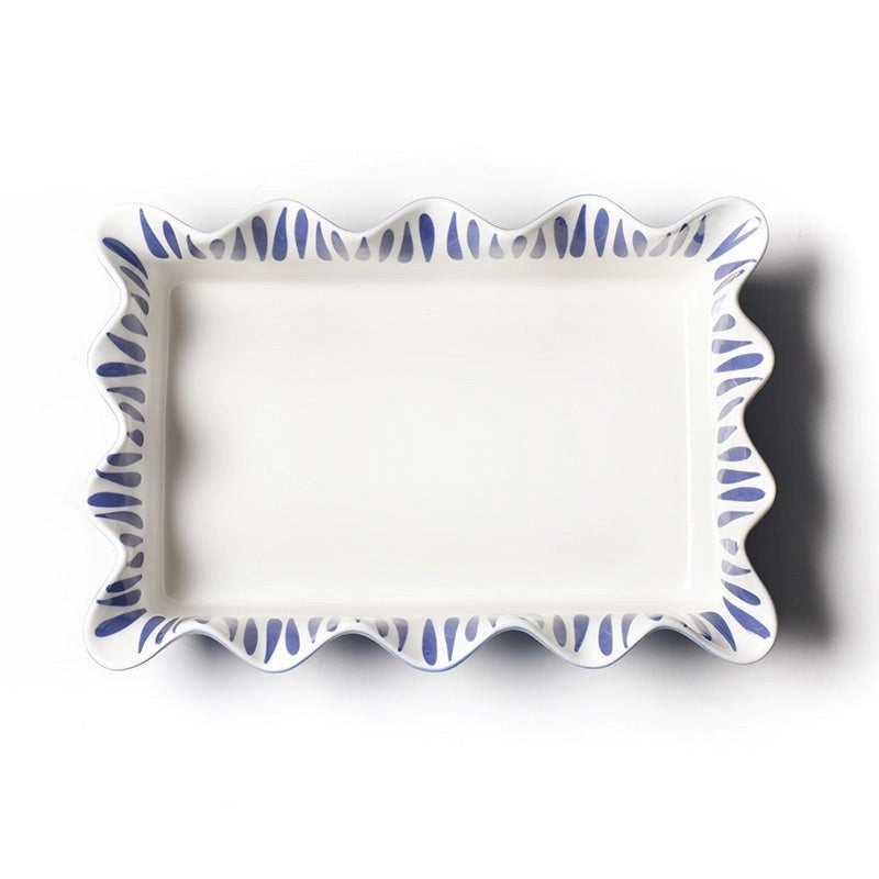 Rectangular ceramic tray with blue decorative border on a white background