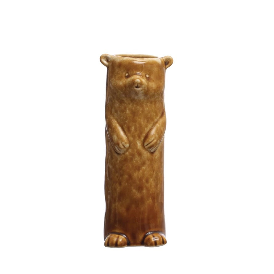 Brown bear-shaped ceramic vase on a white background