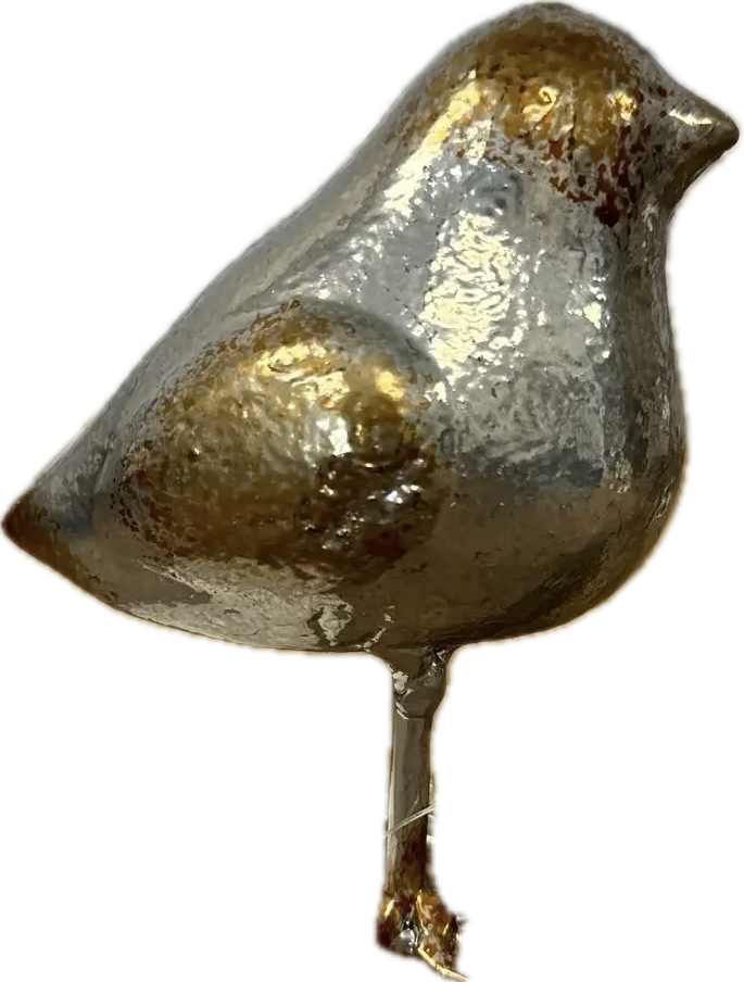 Metallic bird-shaped object on a white background