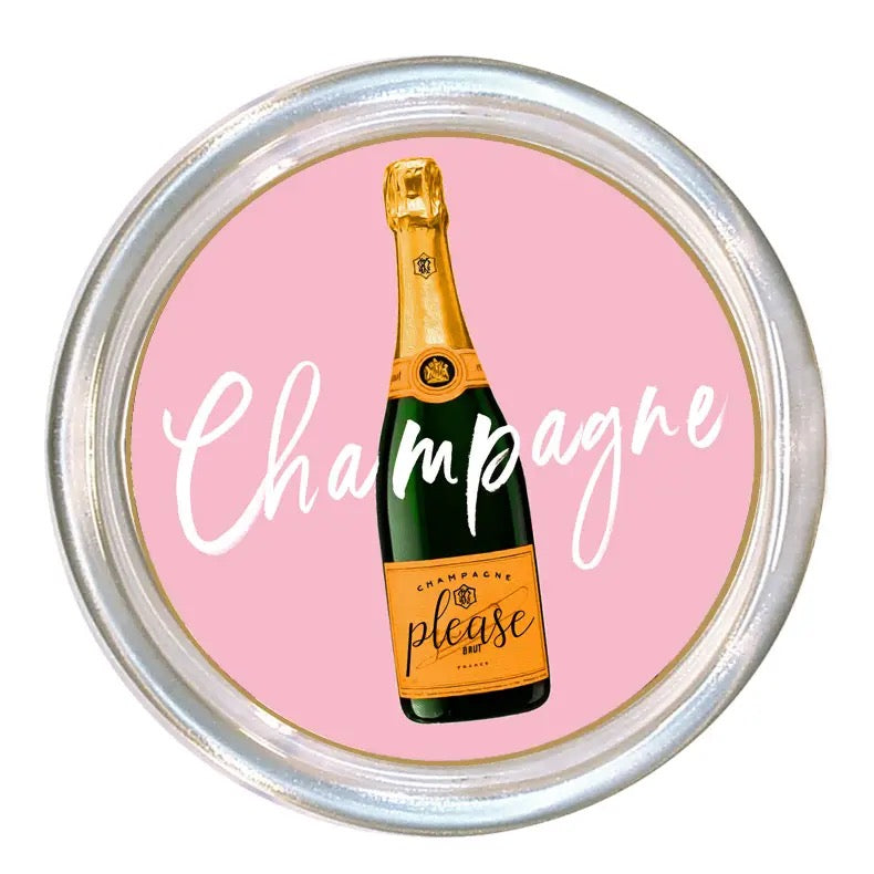 Coaster with champagne bottle illustration and 'Champagne please' text on a pink background