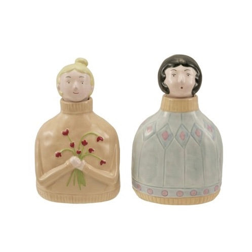 Two ceramic figurines with decorative patterns on a white background