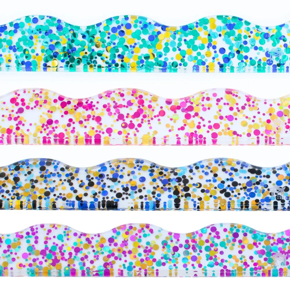 Set of colorful polka dot ribbons with wavy edges on a white background