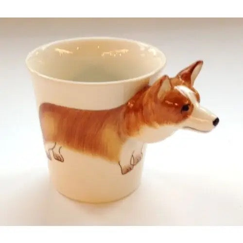 Ceramic mug shaped like a corgi on a white background