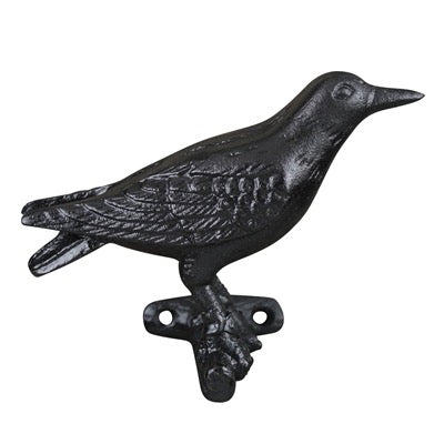 Black cast iron bird-shaped door knocker on a white background