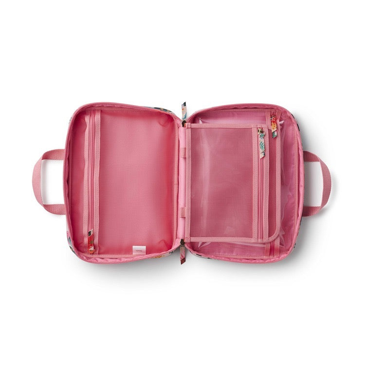 Pink suitcase with open compartments on a white background