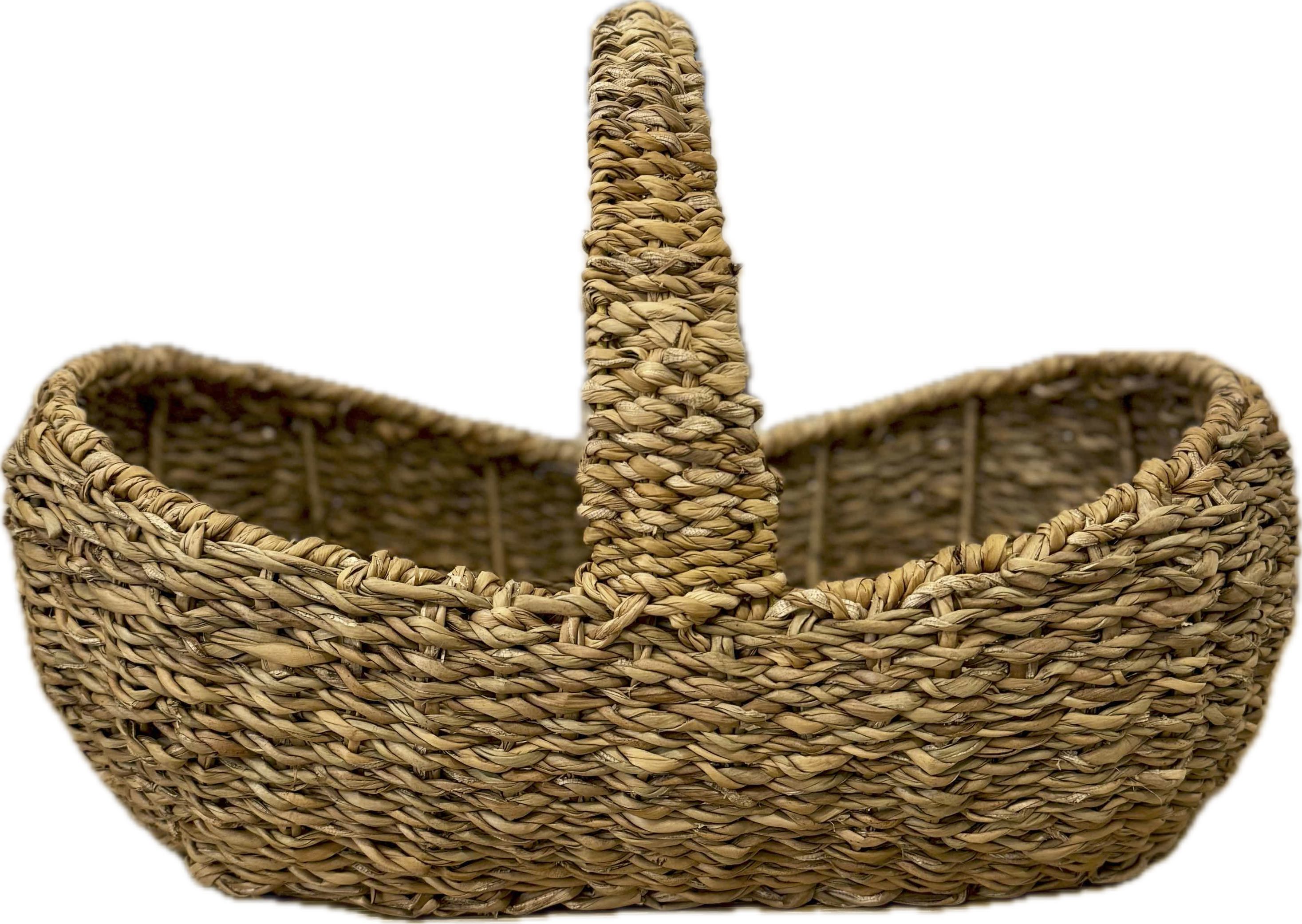 Woven basket with a handle on a white background