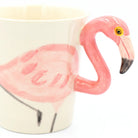 Flamingo-shaped ceramic mug on a white background