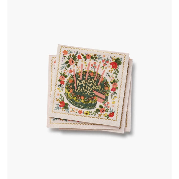 Stack of birthday cards with floral and cake design on a white background
