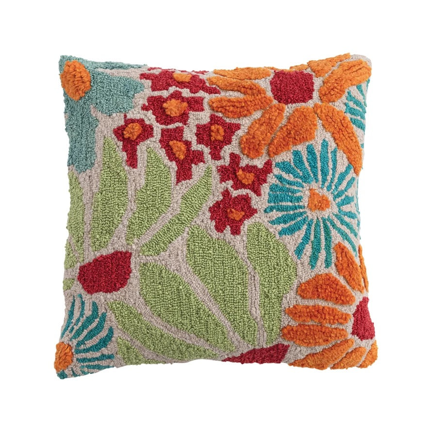 Colorful floral-patterned pillow on a white background