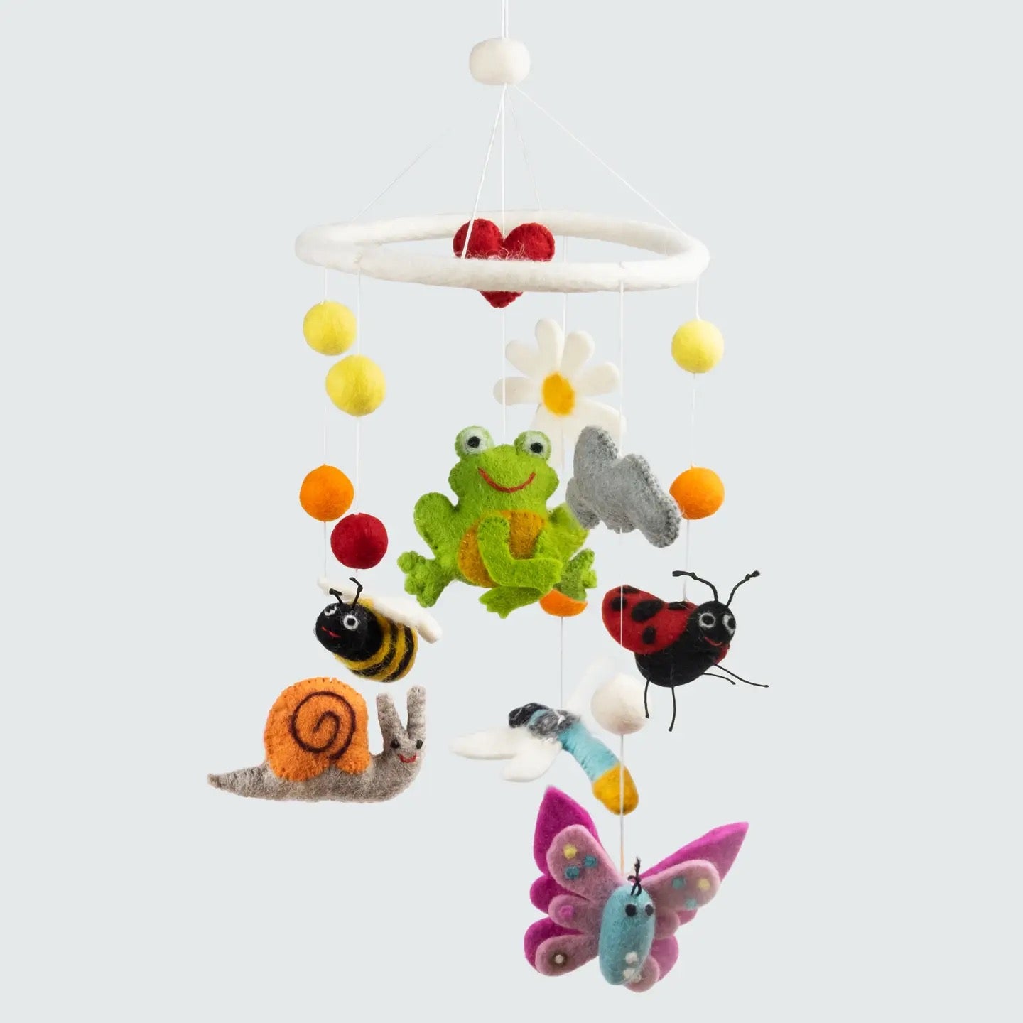 Colorful children's mobile with animals and flowers on a white background