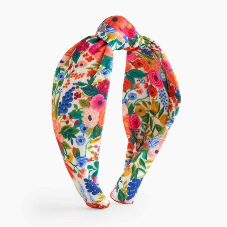 Colorful floral headband on a white background