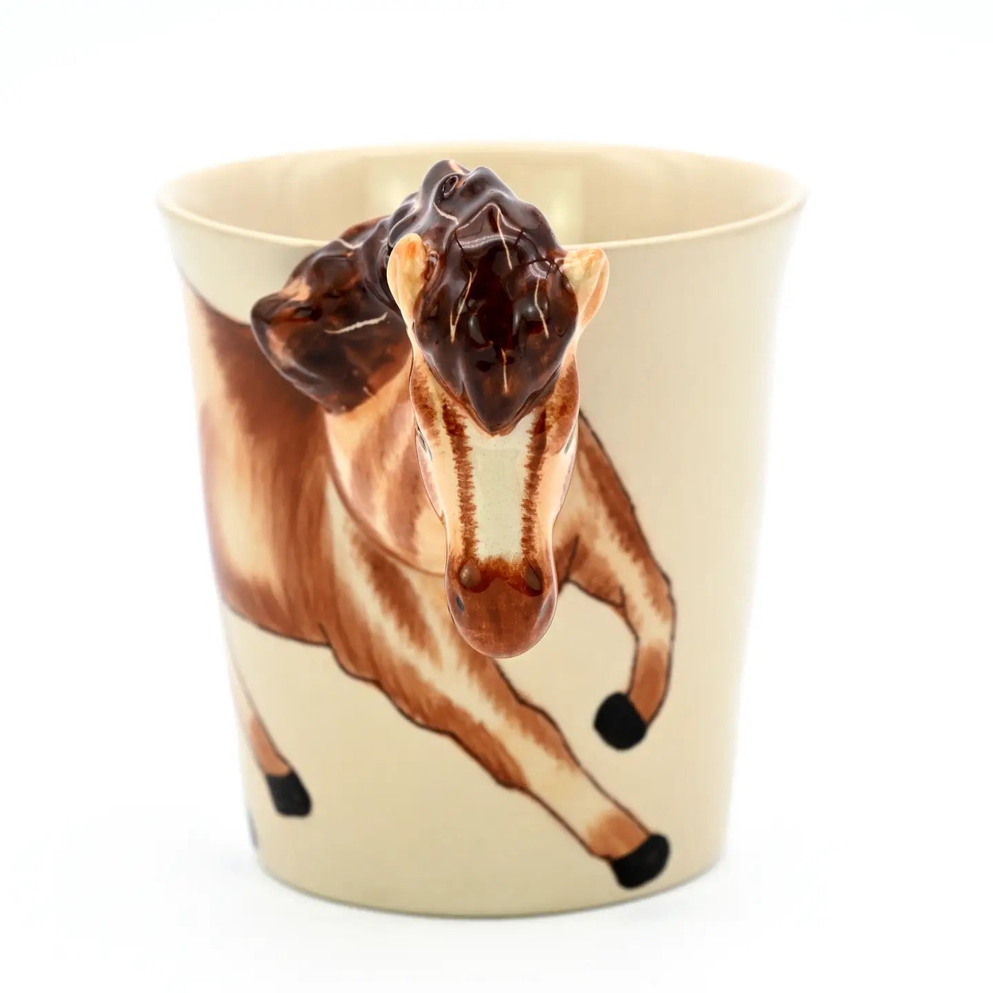 Ceramic mug with a horse design on a white background