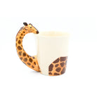 Giraffe-shaped mug on a white background