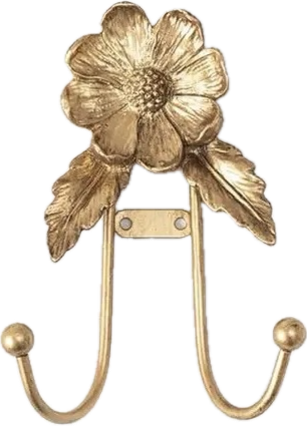 Decorative gold hook with floral design on a white background