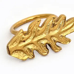 A textured gold leaf ring with a hammered, organic finish, shown on a plain white background.