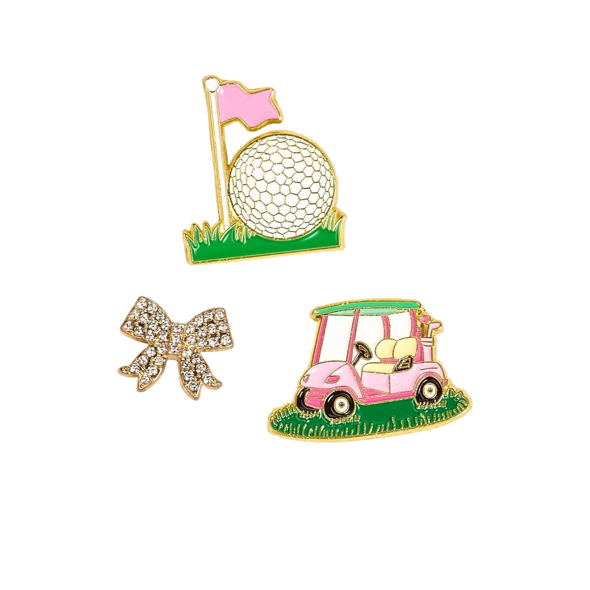 Three pins featuring a golf ball, flag, and golf cart on a beige background