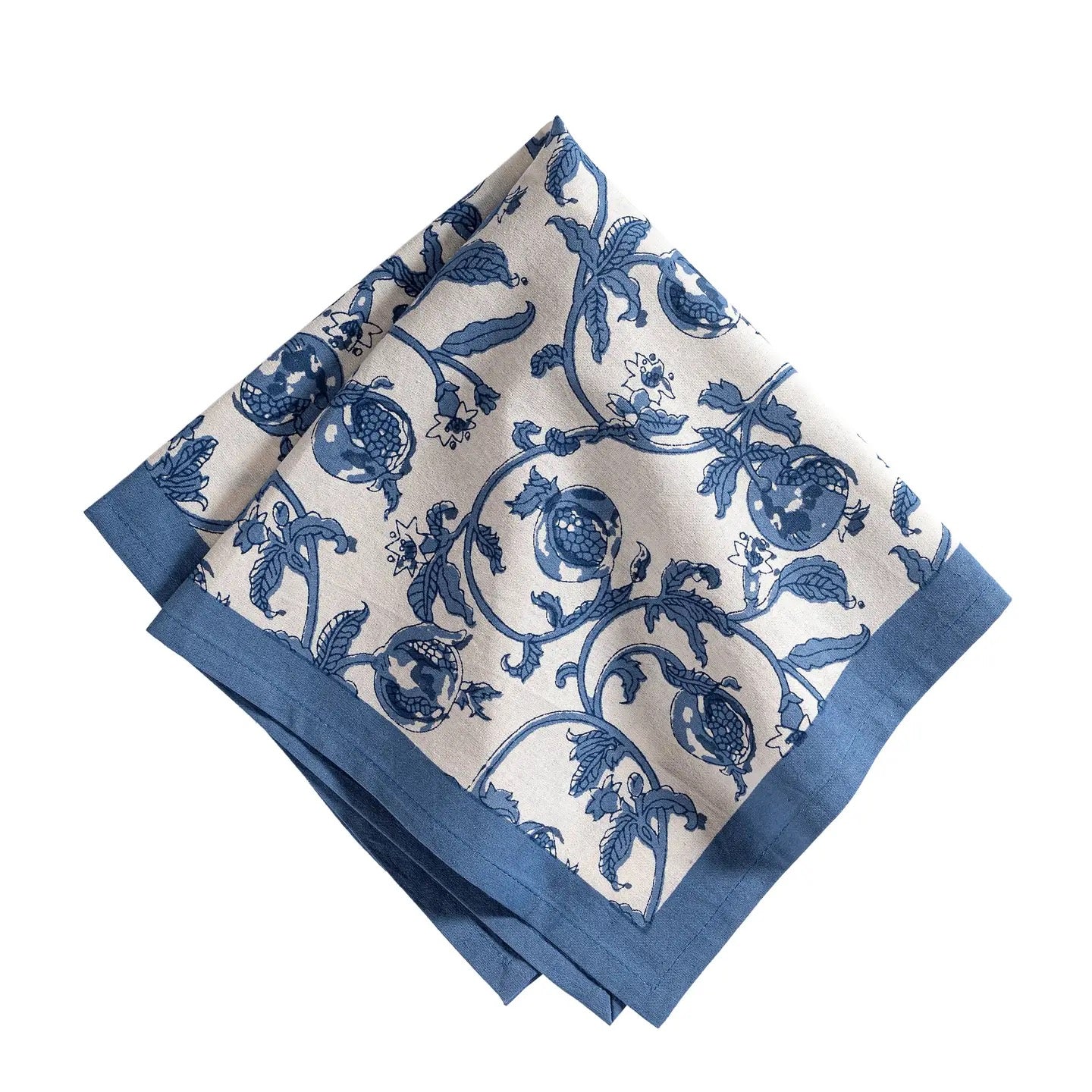 Blue and white patterned napkin on a white background