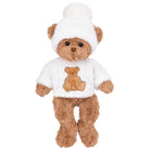 Plush teddy bear wearing a white outfit with a teddy bear design on a white background