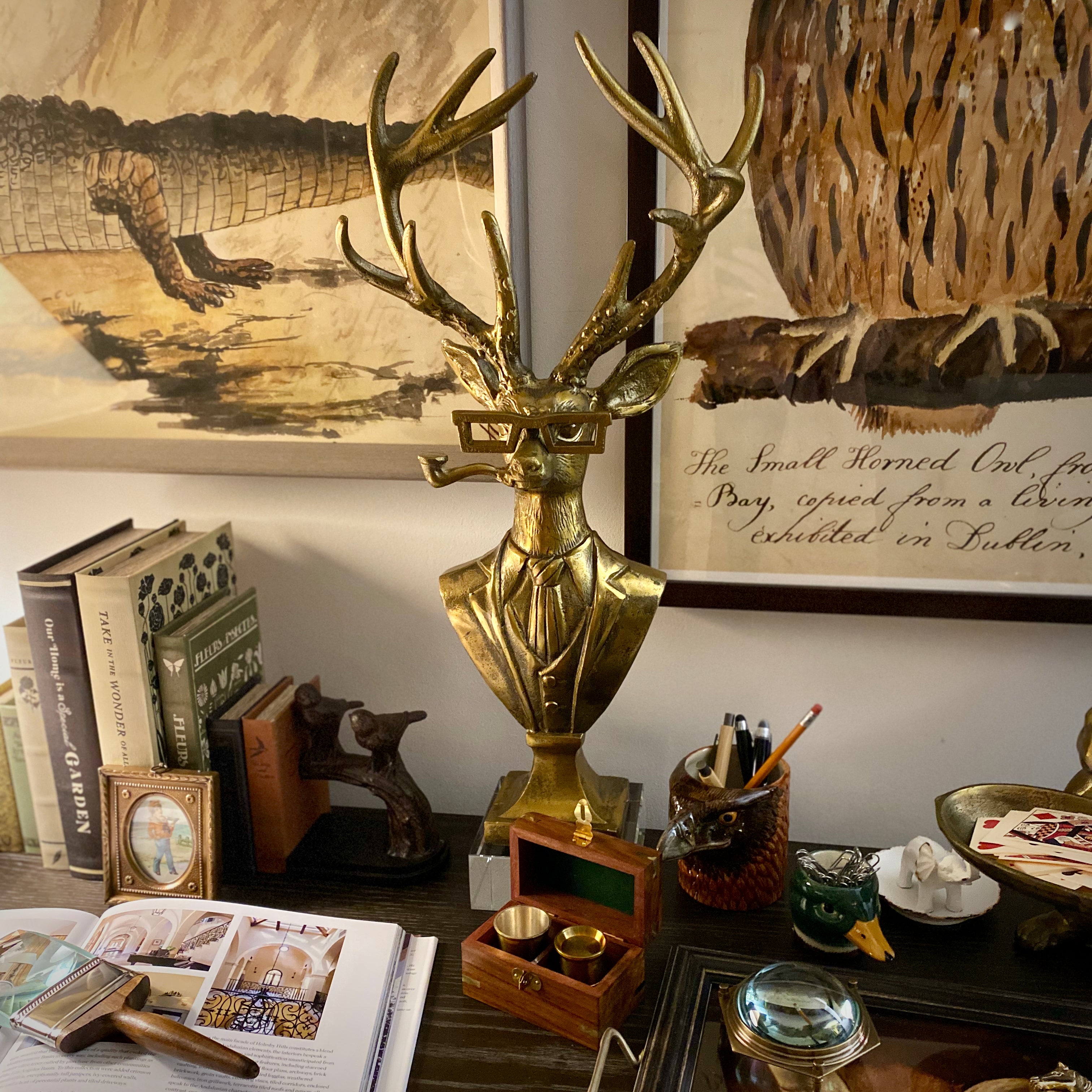 Frankie the Stag Bust, made of metal with an antique brass finish.
