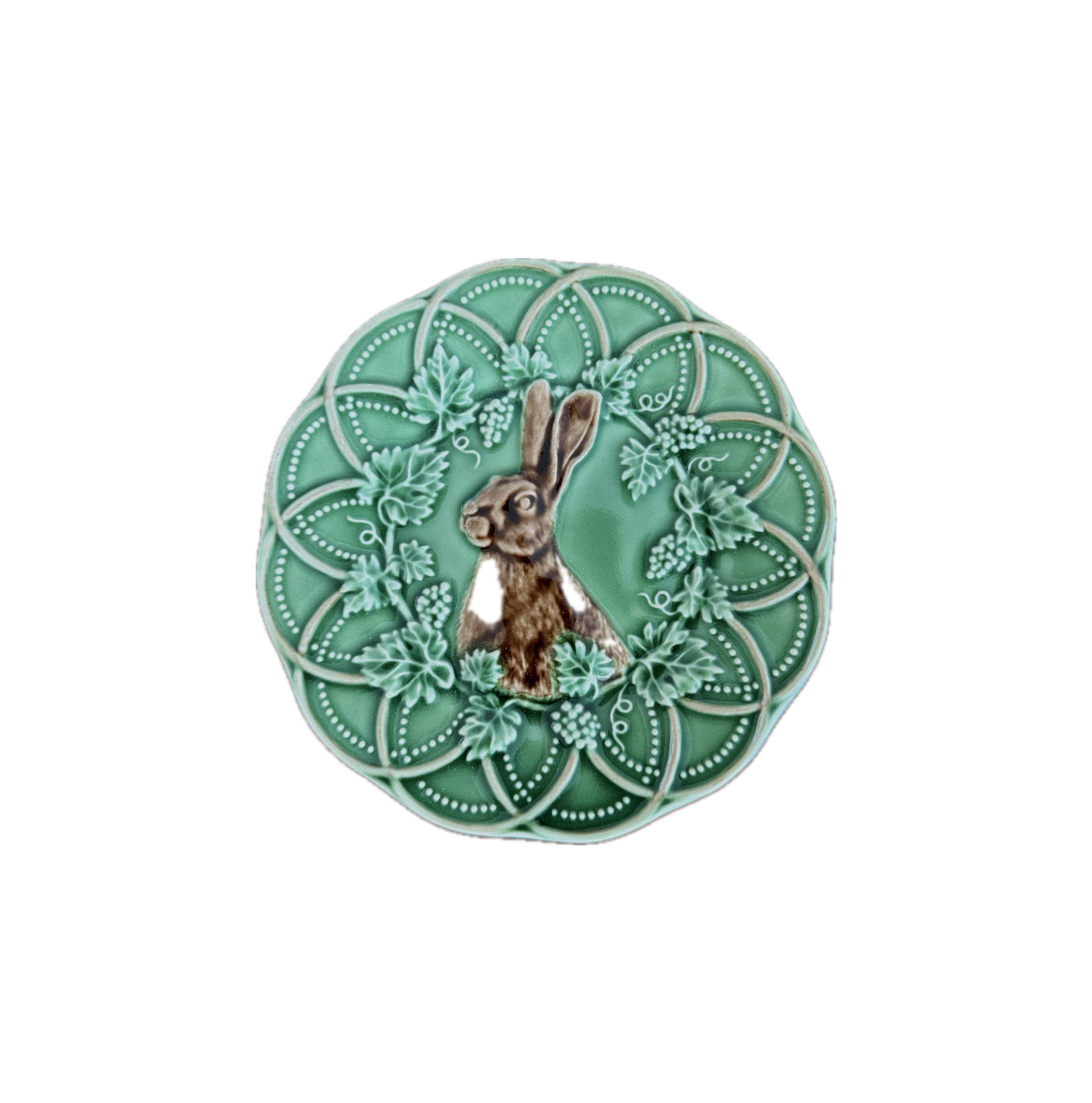 Decorative plate with a rabbit design on a green background