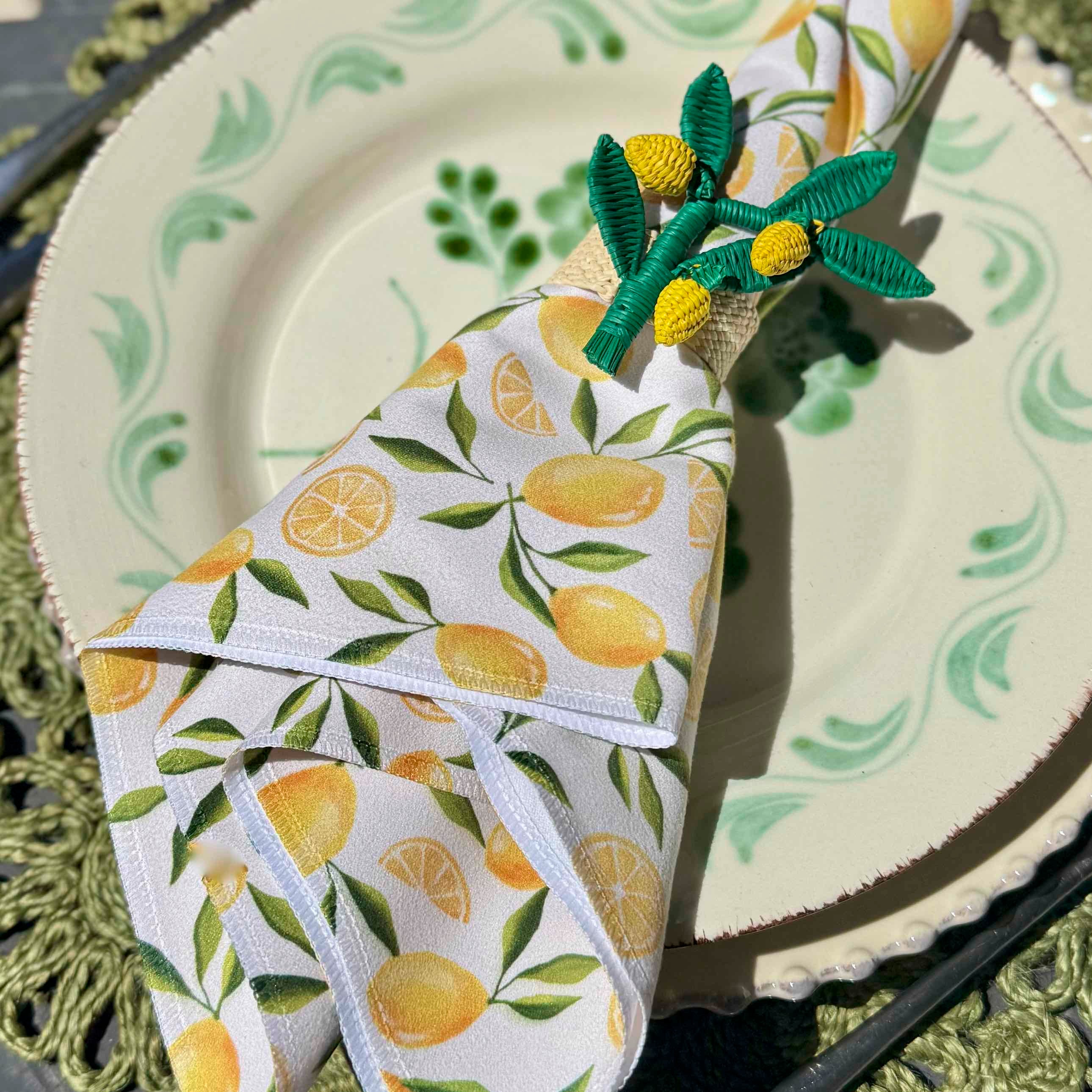Napkin with lemon pattern on a decorative plate