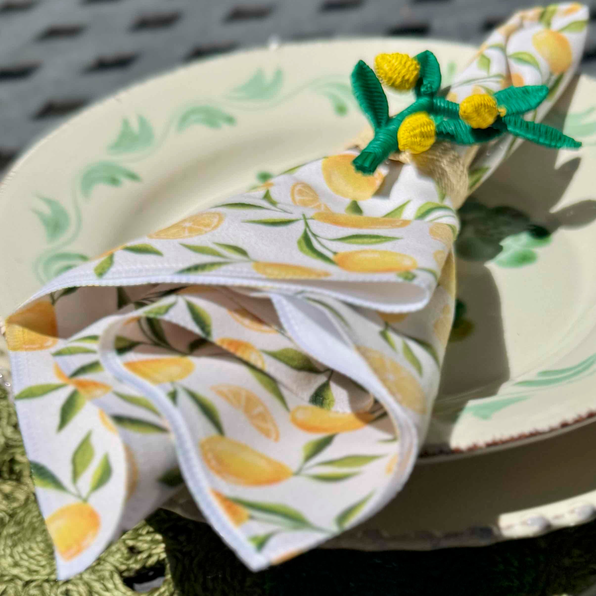 Napkin with lemon pattern on a plate
