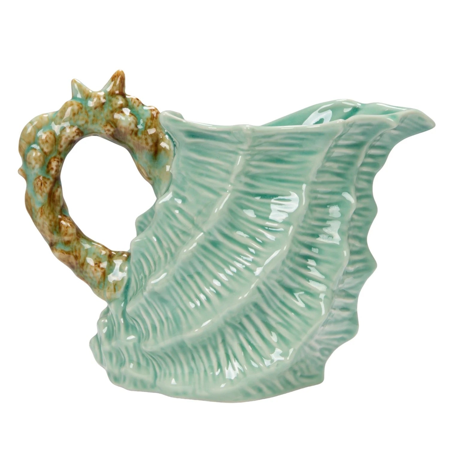 Ceramic leaf-shaped container with textured surface on a white background