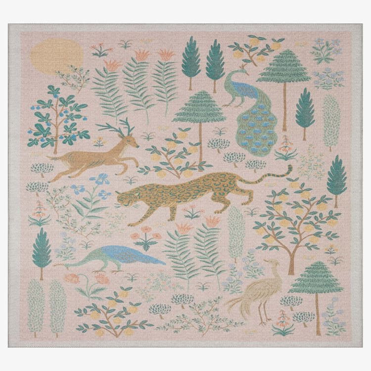 Decorative rug with animal and nature pattern on a beige background