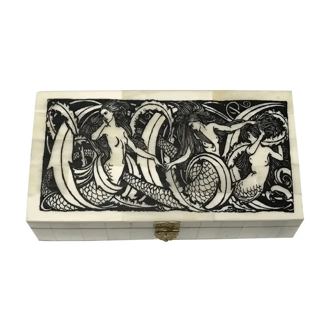 Decorative box with mermaid design on a white background