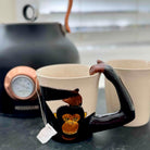 Mug with monkey design on a kitchen counter