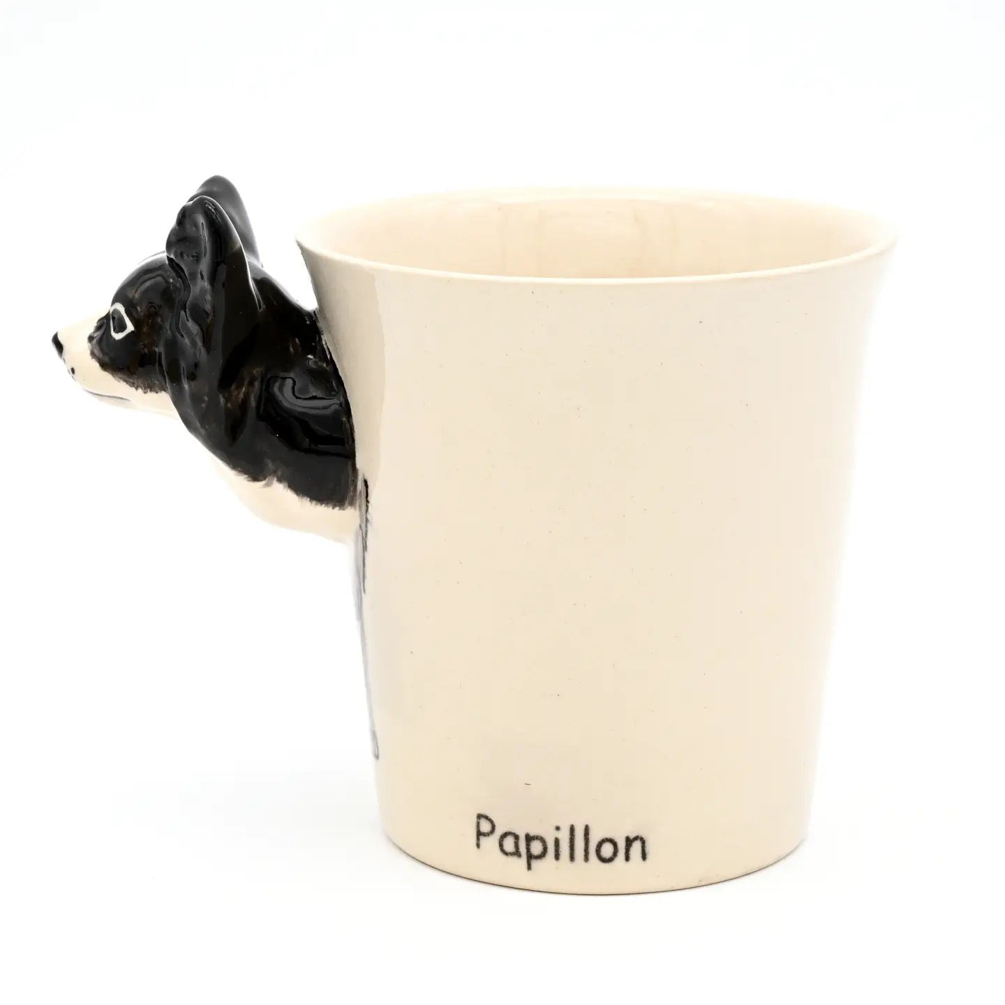 Mug with a black dog-shaped handle labeled 'Papillon' on a white background