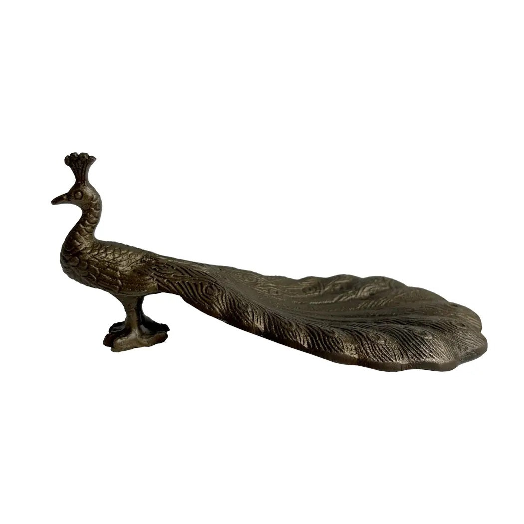 Bronze peacock sculpture on a white background