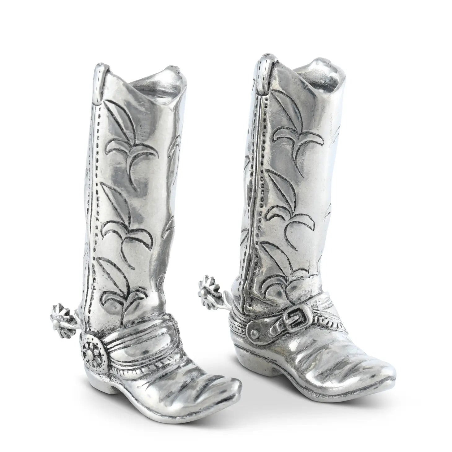A pair of pewter salt and pepper shakers designed to look like cowboy boots, featuring detailed embossing and spurs.