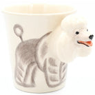 Ceramic mug with a dog design on a white background