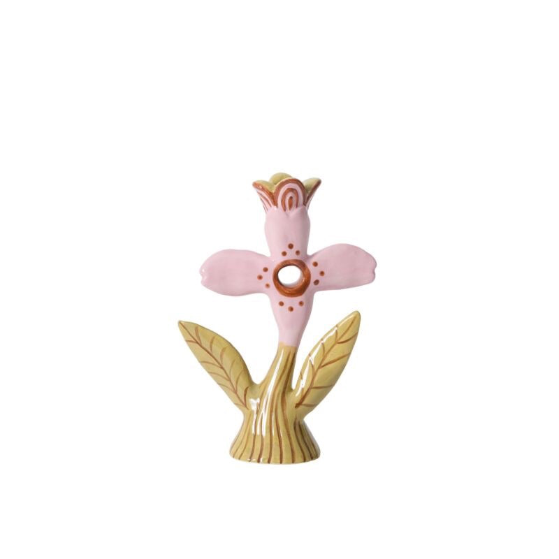 Decorative pink flower-shaped object with gold accents on a white background