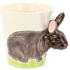 Ceramic mug with a rabbit design on a white background