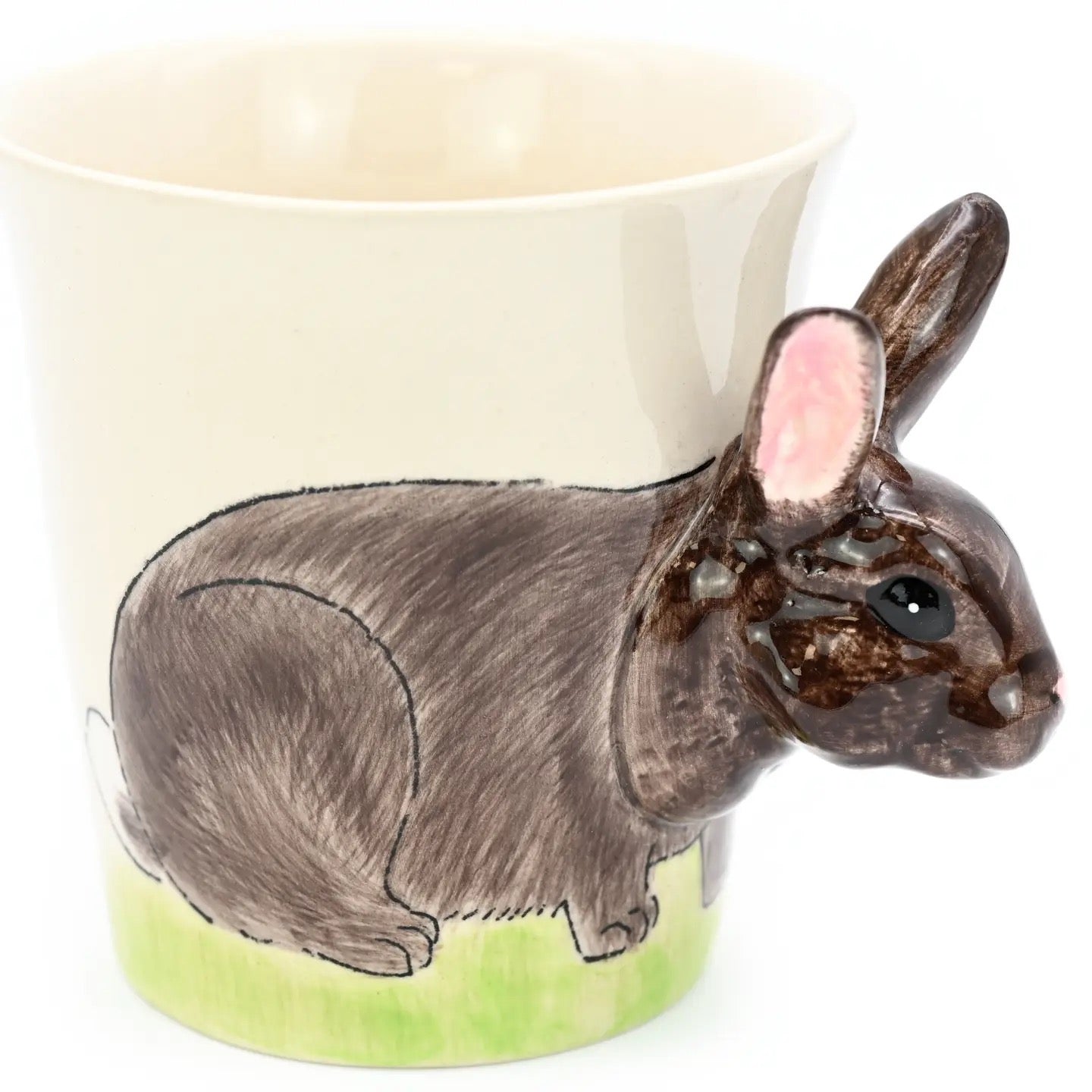 Ceramic mug with a rabbit design on a white background