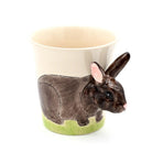 Ceramic mug with a rabbit design on a white background