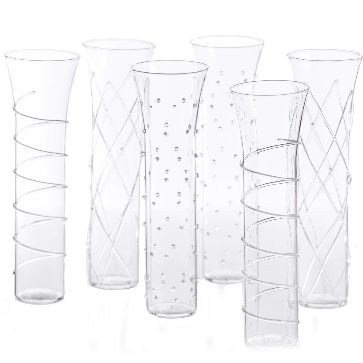 Set of clear glass vases with decorative patterns on a white background