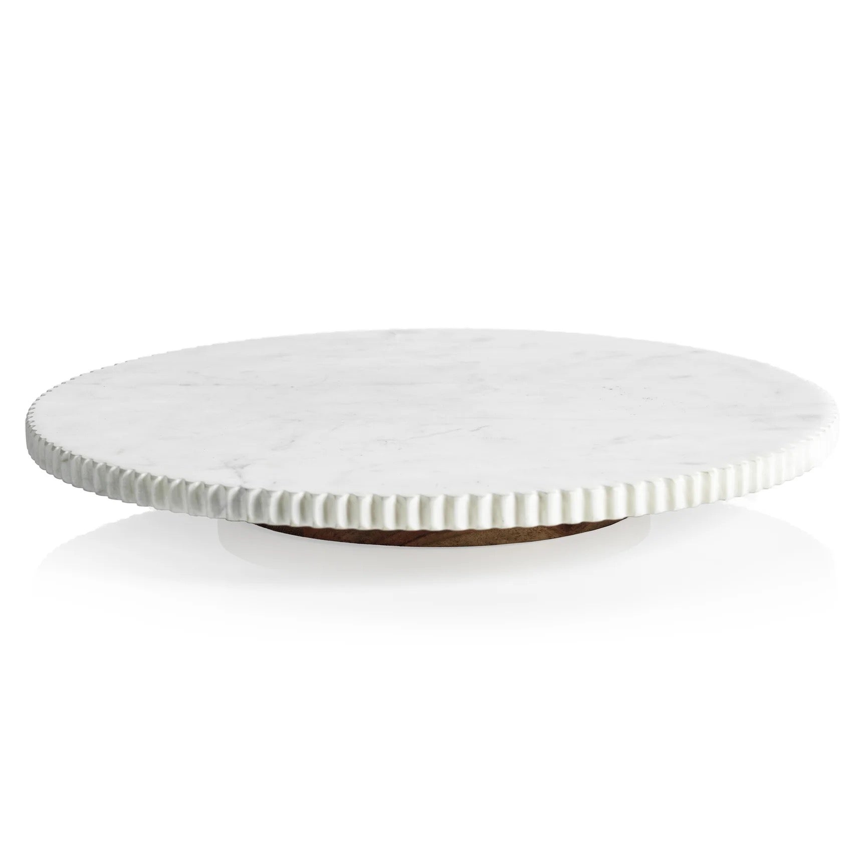 Round white marble cake stand on a white background
