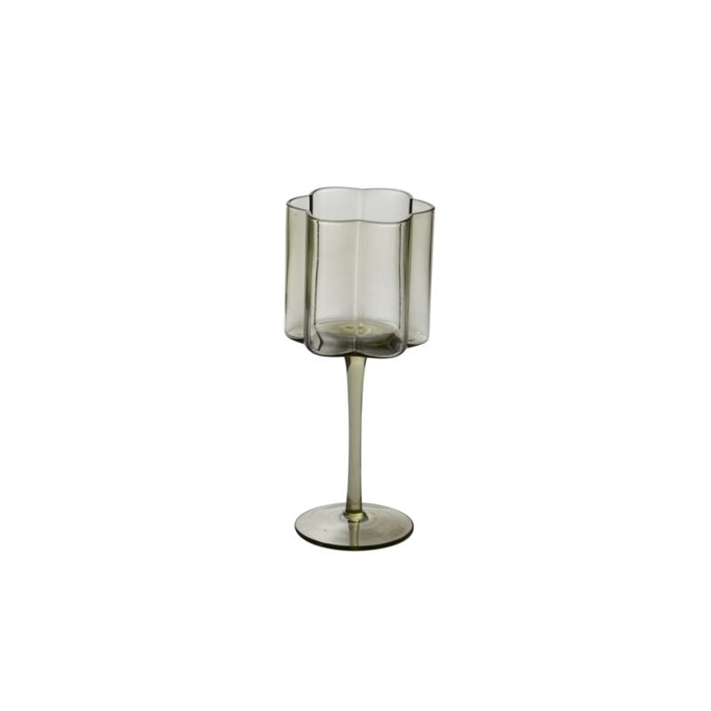 Smoky green glass candle holder on a white background