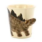 Ceramic mug with a stegosaurus design on a white background