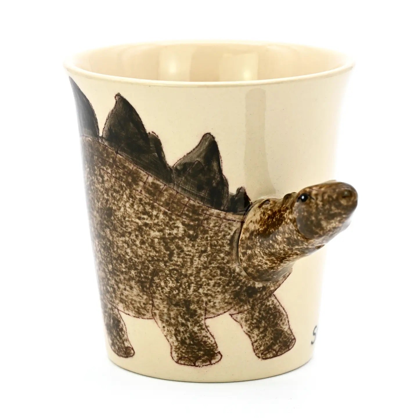 Ceramic mug with a stegosaurus design on a white background