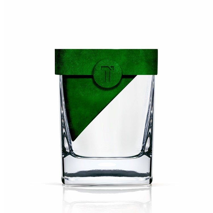 Clear glass container with green lid on a white background