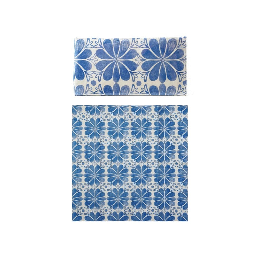 Blue floral patterned bedding set on a white background