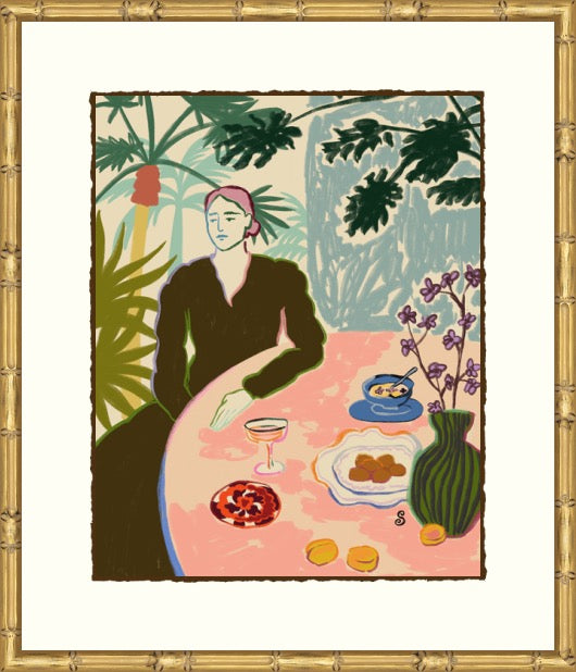 A framed art print featuring an illustration of a woman seated at a table with food and plants, surrounded by a wide white mat and ornate gold frame.